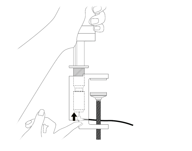 diagram showing how to push the jack plug into the base